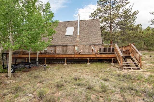 244 Lariat Loop, Hartsel, CO 80449 - back of house with roof with shingles and a deck