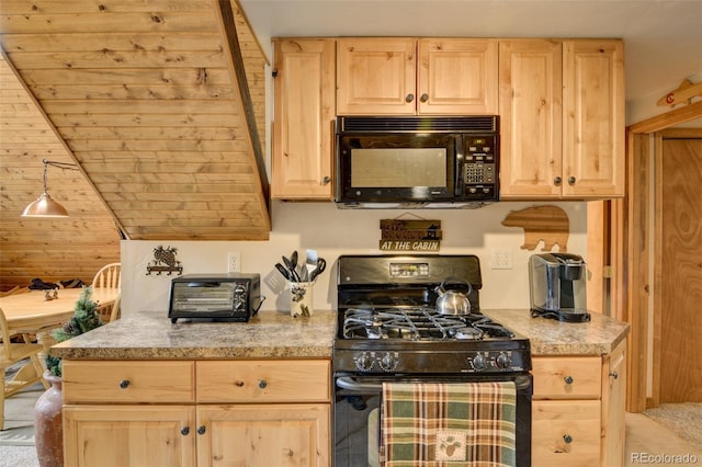 244 Lariat Loop, Hartsel, CO 80449 - kitchen featuring black appliances and light brown cabinets