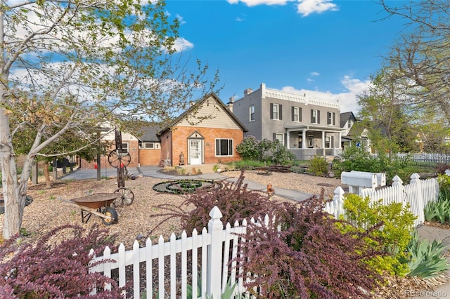 1748 S Logan St, Denver, CO 80210 - view of front of home with brick siding