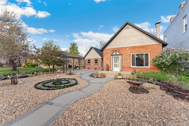 1748 S Logan St, Denver, CO 80210 - view of front of home with brick siding
