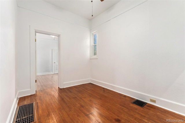 1748 S Logan St, Denver, CO 80210 - unfurnished room with hardwood / wood-style flooring, baseboards, and a ceiling fan
