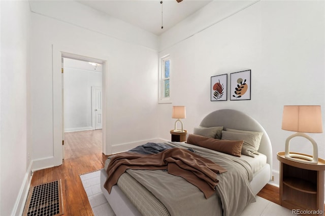 1748 S Logan St, Denver, CO 80210 - bedroom with wood finished floors and baseboards