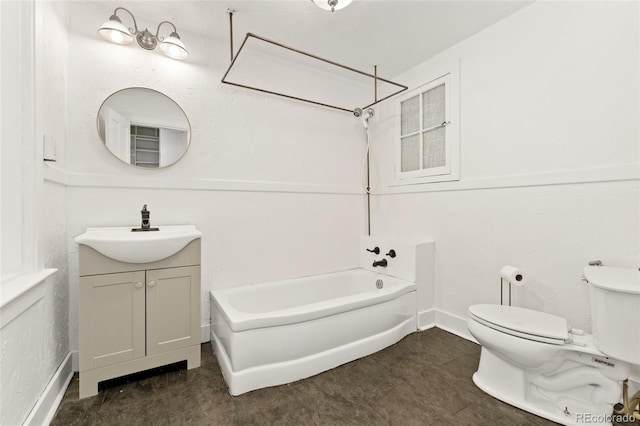 1748 S Logan St, Denver, CO 80210 - full bath featuring toilet, shower / washtub combination, vanity, and baseboards