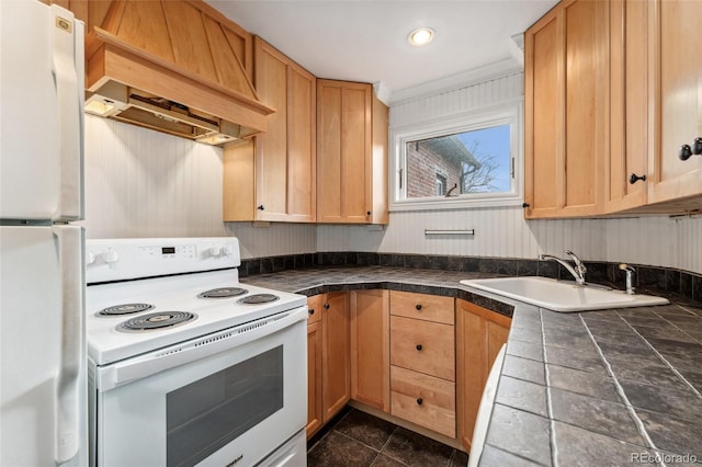 1748 S Logan St, Denver, CO 80210 - kitchen featuring white appliances, a sink, custom range hood, tile countertops, and light brown cabinetry
