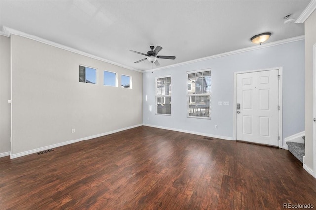 interior space with ceiling fan, ornamental molding, and dark hardwood / wood-style floors