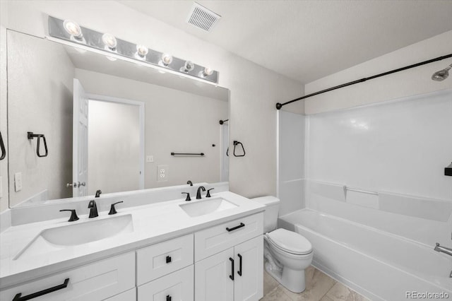 full bathroom with vanity, bathing tub / shower combination, and toilet