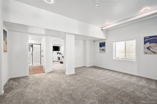 25362 E Indore Dr, Aurora, CO 80016 - basement featuring carpet floors and baseboards