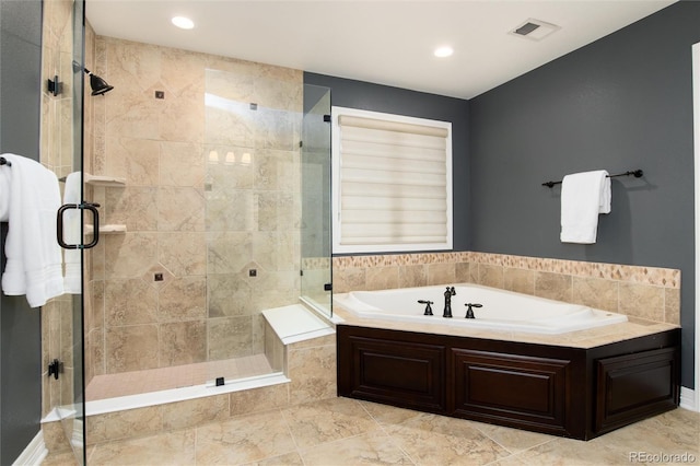 bathroom featuring plus walk in shower