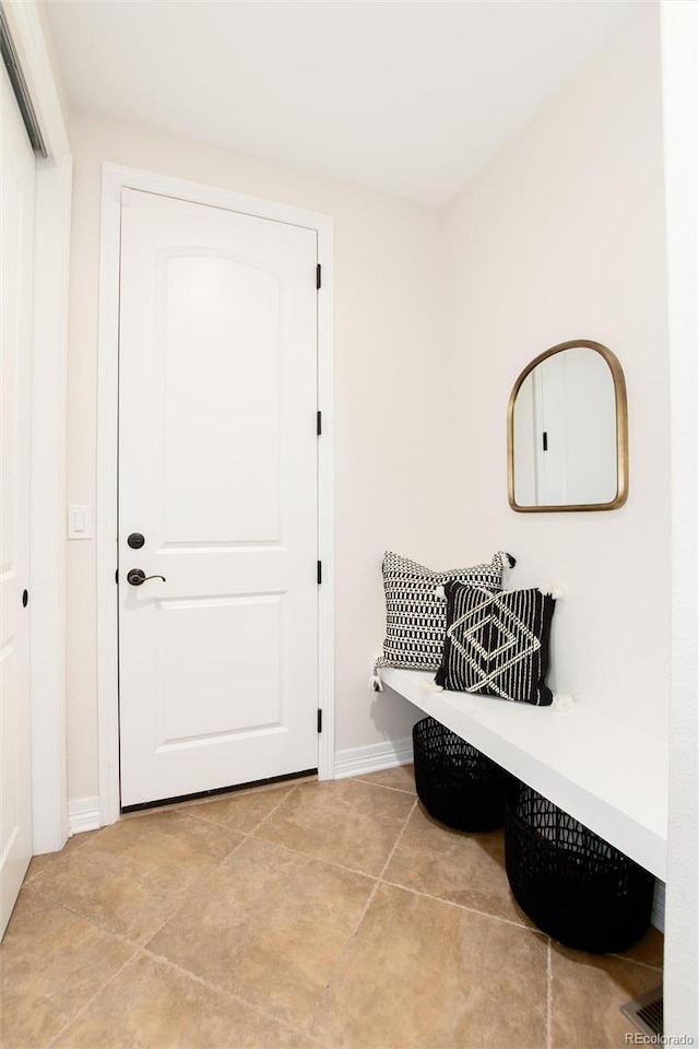 mudroom featuring light tile patterned floors