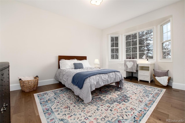 bedroom featuring dark hardwood / wood-style floors