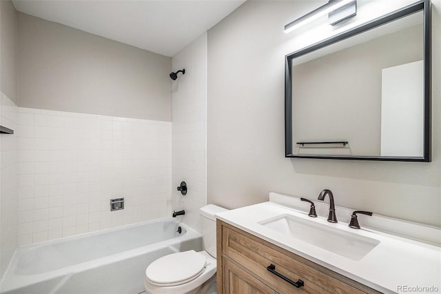 bathroom featuring toilet, shower / tub combination, and vanity