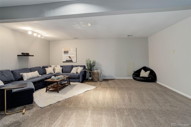 carpeted living room with baseboards and visible vents