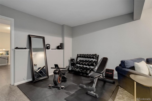 exercise room with baseboards