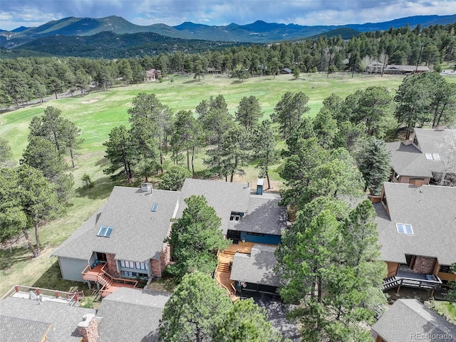bird's eye view with a mountain view and golf course view