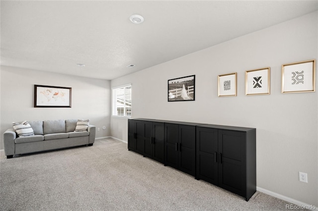 21925 E 44th Pl, Aurora, CO 80019 - living room with light colored carpet and baseboards