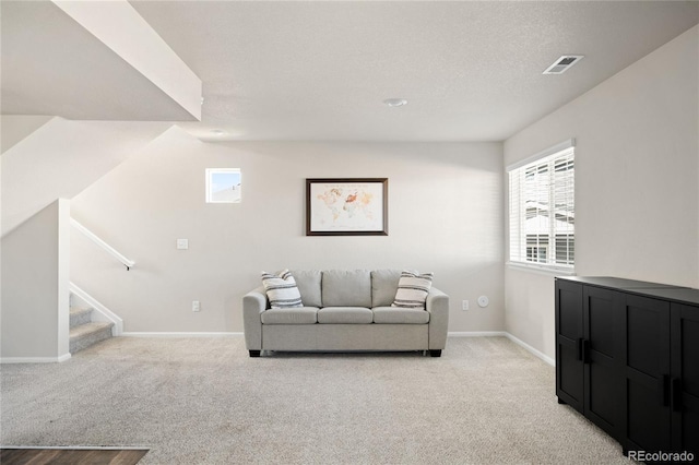 21925 E 44th Pl, Aurora, CO 80019 - living area featuring light carpet and stairway