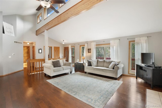 120 Red Rock Ct, Woodland Park, CO 80863 - living room featuring a ceiling fan, beamed ceiling, dark wood-style floors, high vaulted ceiling, and ornate columns
