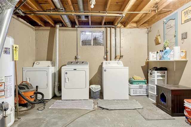 washroom featuring washer and clothes dryer and gas water heater