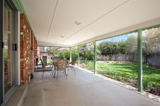 view of patio / terrace featuring outdoor dining area and a fenced backyard