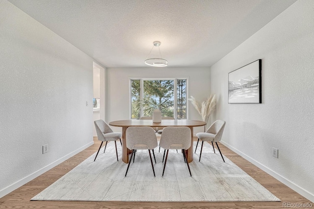 dining area featuring light hardwood / wood-style flooring