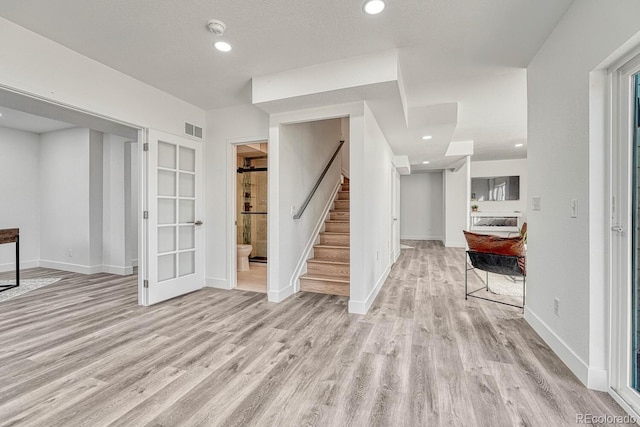 interior space with light hardwood / wood-style floors