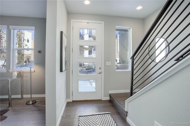 entrance foyer featuring dark wood-type flooring