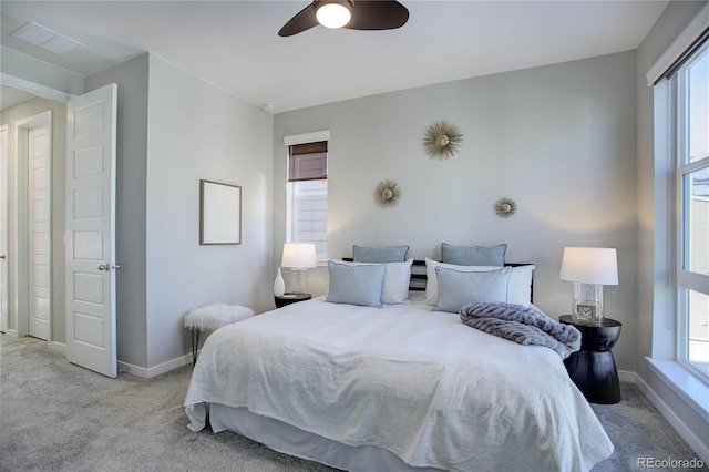 carpeted bedroom featuring ceiling fan