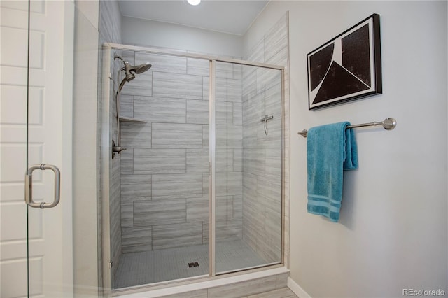 bathroom featuring an enclosed shower