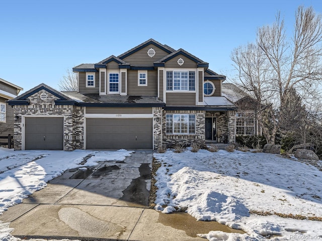 front of property with a garage