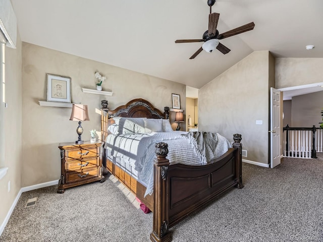 bedroom featuring ceiling fan, carpet flooring, and vaulted ceiling