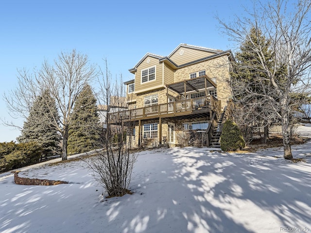 view of front of property featuring a deck