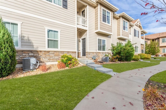 exterior space featuring central AC unit