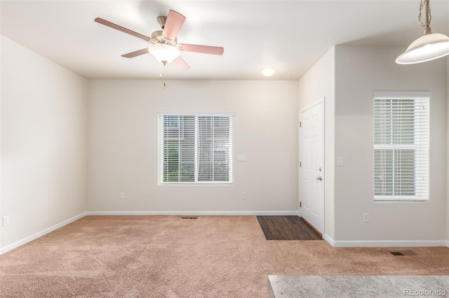 interior space featuring ceiling fan