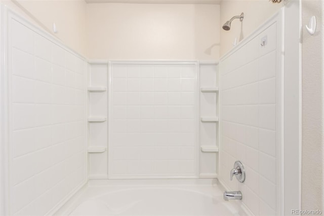 bathroom with shower / bathtub combination