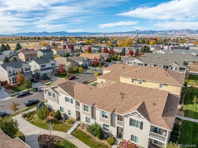 birds eye view of property featuring a mountain view