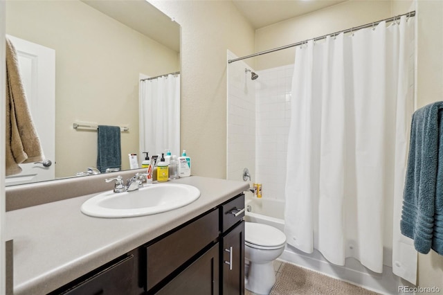 full bath featuring vanity, toilet, and shower / bath combo with shower curtain