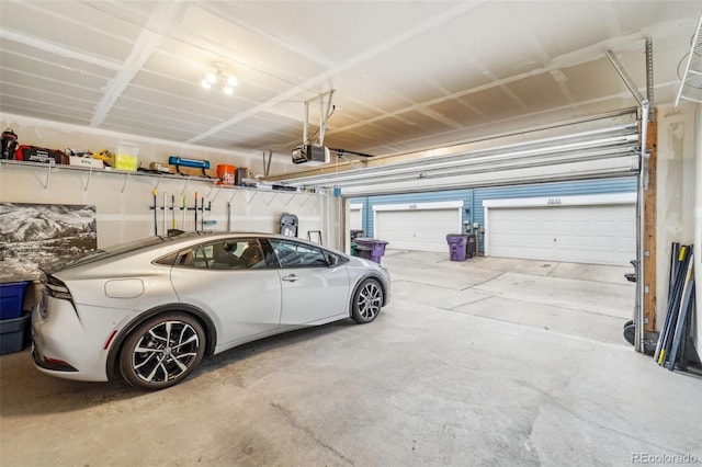 garage featuring a garage door opener