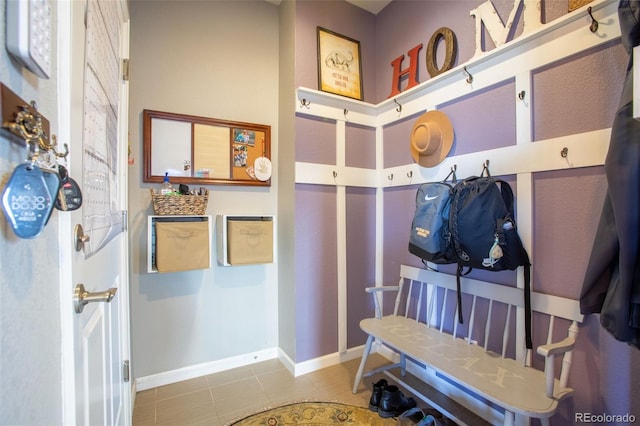 mudroom with light tile patterned floors