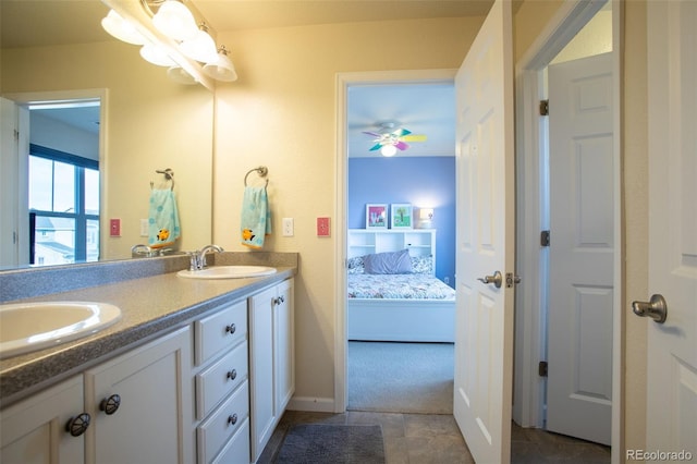 bathroom with ceiling fan and vanity