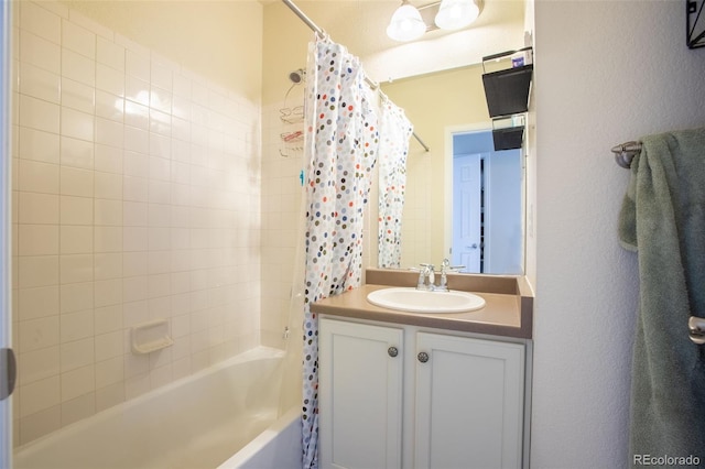 bathroom with vanity and shower / bath combination with curtain