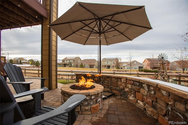 view of patio / terrace with a fire pit