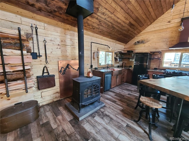 148 Wakonda Ln, Hartsel, CO 80449 - kitchen with wood walls, lofted ceiling, plenty of natural light, wooden ceiling, and dark wood-style flooring