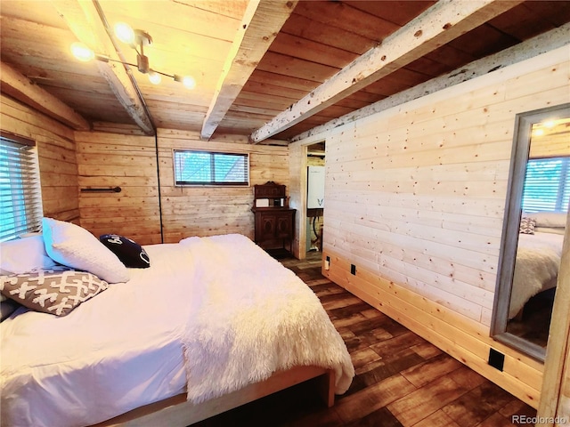 148 Wakonda Ln, Hartsel, CO 80449 - bedroom with wood walls, a wooden ceiling with exposed beams, dark wood finished floors, and multiple windows
