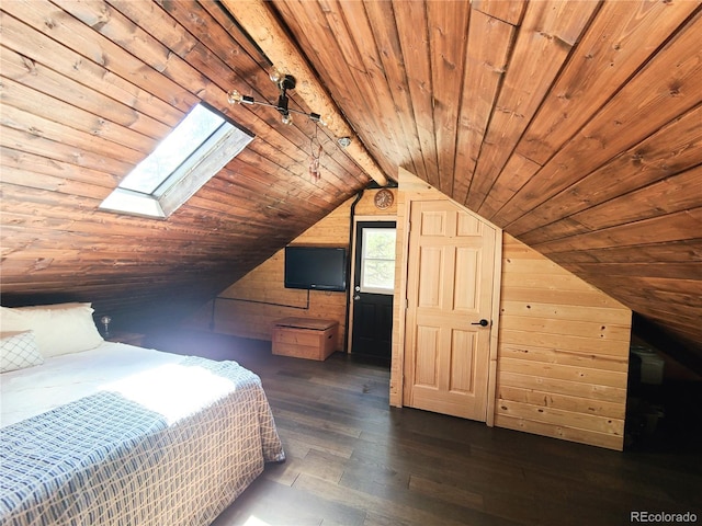 148 Wakonda Ln, Hartsel, CO 80449 - bedroom with wood ceiling, wood walls, hardwood / wood-style floors, vaulted ceiling, and a skylight