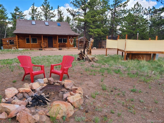 148 Wakonda Ln, Hartsel, CO 80449 - view of yard with covered porch and an outdoor fire pit