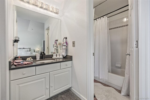 6260 Everett Ct Unit D, Arvada, CO 80004 - bathroom featuring vanity and shower / bath combination with curtain