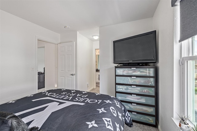 6260 Everett Ct Unit D, Arvada, CO 80004 - carpeted bedroom with baseboards and ensuite bathroom