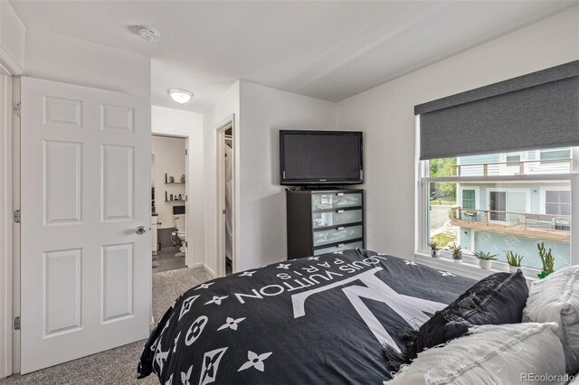 6260 Everett Ct Unit D, Arvada, CO 80004 - carpeted bedroom featuring connected bathroom