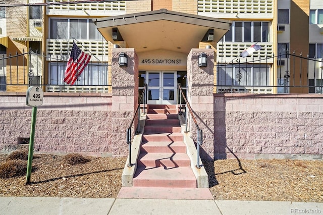 entrance to property with brick siding