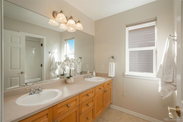 bathroom with vanity and tile patterned flooring